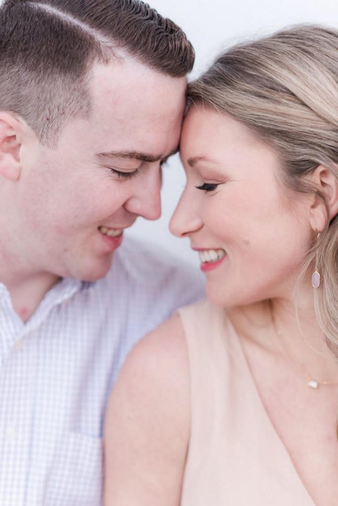 close up of couple smiling at each other