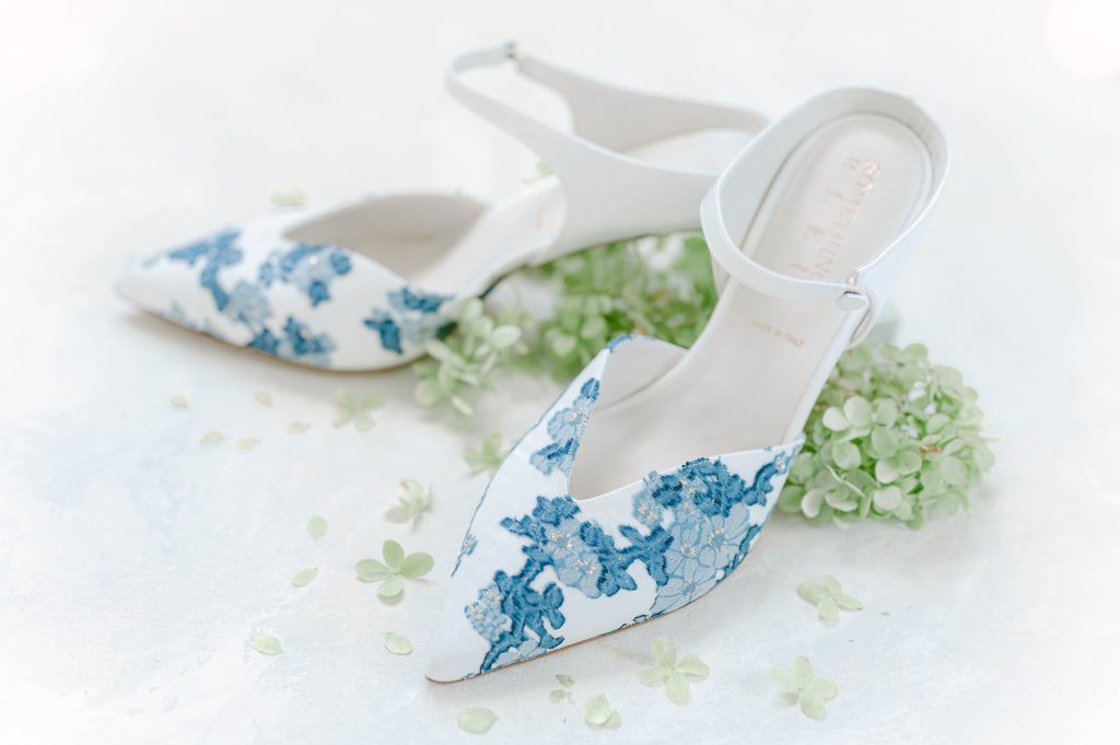 white low heel shoes with blue floral pattern