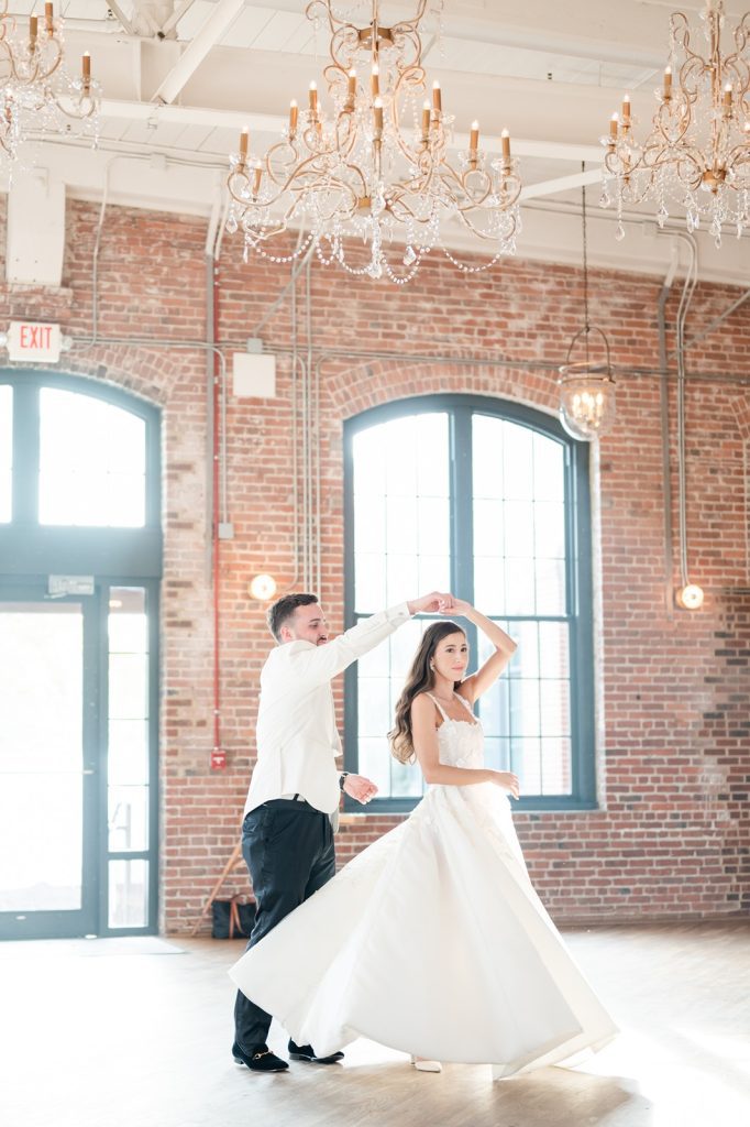 Newlyweds twirl during first dance