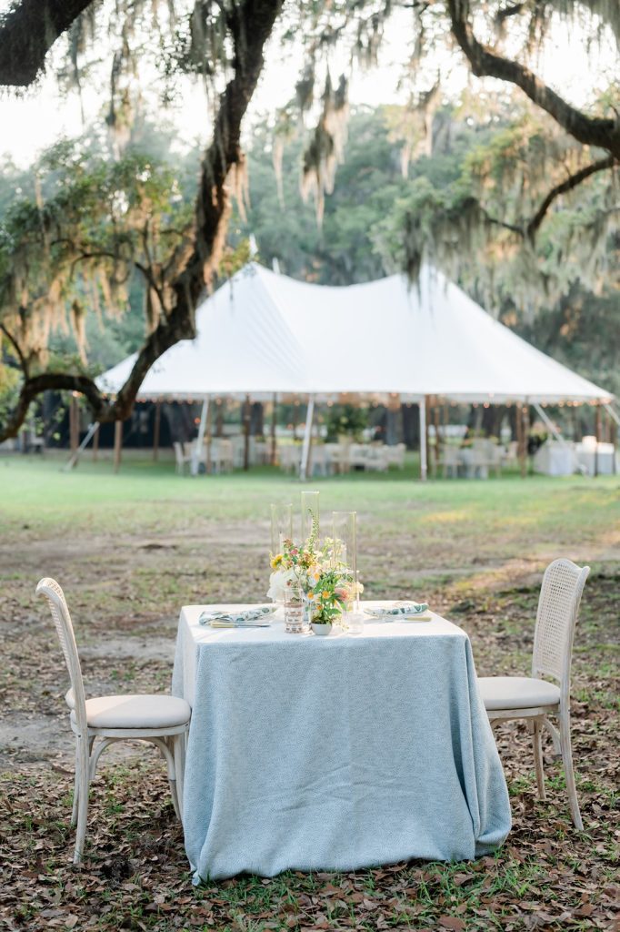 sweetheart table set up outside of wedding reception tent