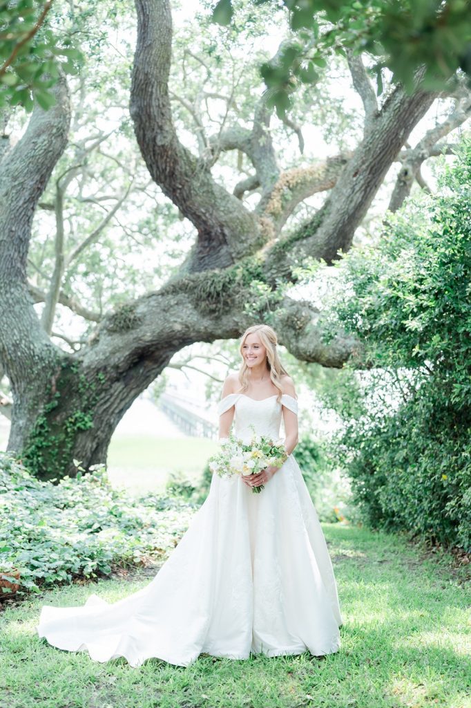 bridal portrait of bride looking off camera in garden
