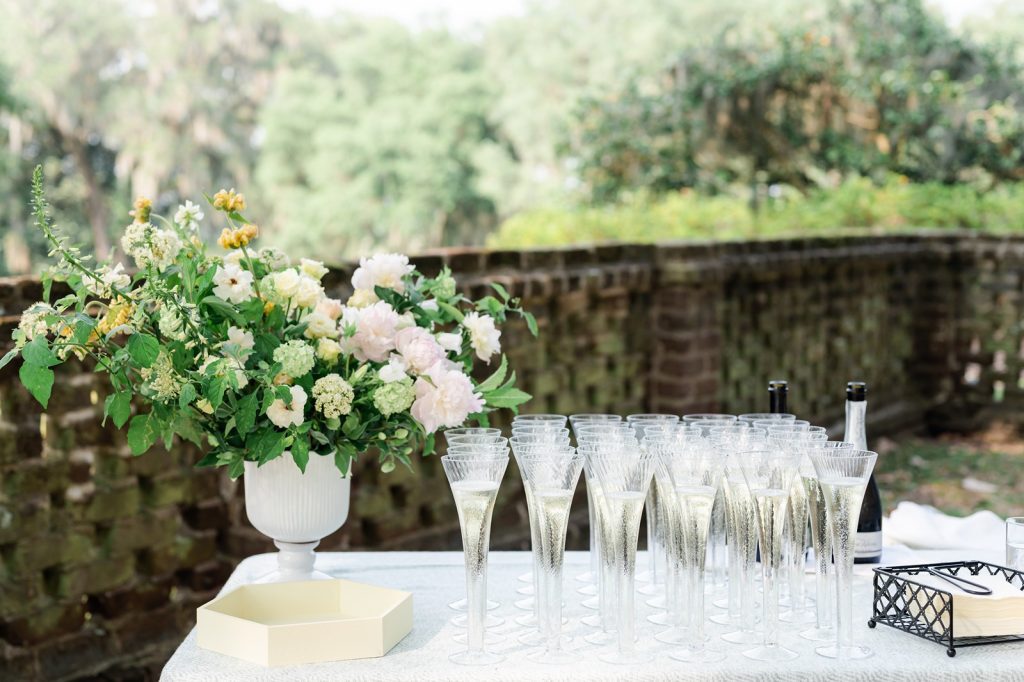 multiple flutes filled with champagne