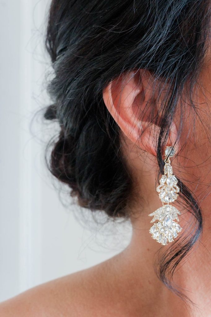 closeup of dangling crystal earring
