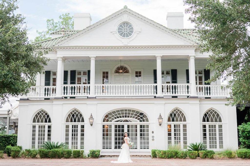 Bride standing outside of Lowndes Grove House
